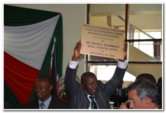 project leader-kenya recceiving the centre plague